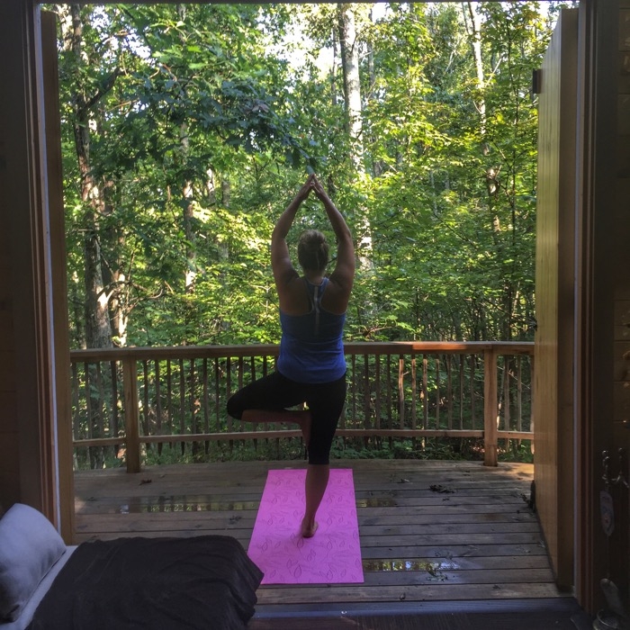 yoga on deck at Earthjoy Treehouse